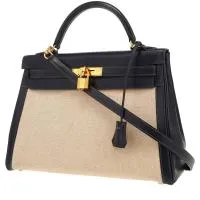 Сумка Hermès Kelly высотой 32 см из темно-синей коробчатой кожи и бежевой парусины.