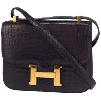 Сумка Hermès Constance темно-синего цвета под крокодила.