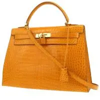 Сумка Hermès Kelly 32 см из оранжевого цвета кожи крокодила.