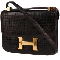 Сумка Hermès Constance из коричневого цвета кожи крокодила.