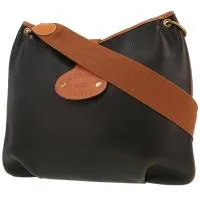 Сумочка Hermès из двухцветной кожи черного и золотого цветов.