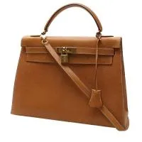 Сумка Hermès Kelly 32 см из золотистой кожи Pecari