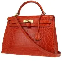 Сумка Hermès Kelly 32 см из оранжевого цвета кожи крокодила.