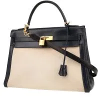 Сумка Hermès Kelly высотой 32 см из темно-синей коробчатой кожи и бежевой парусины.