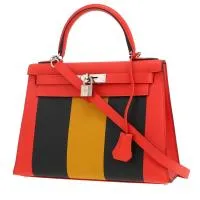 Сумка Hermès Kelly Kelly 28 см из кожи Capucine Epsom, янтарно-желтого и темно-синего цветов.